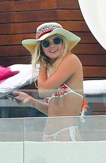 LOUISA JOHNSON in Bikini at a Pool in Ibiza 07/03/2018