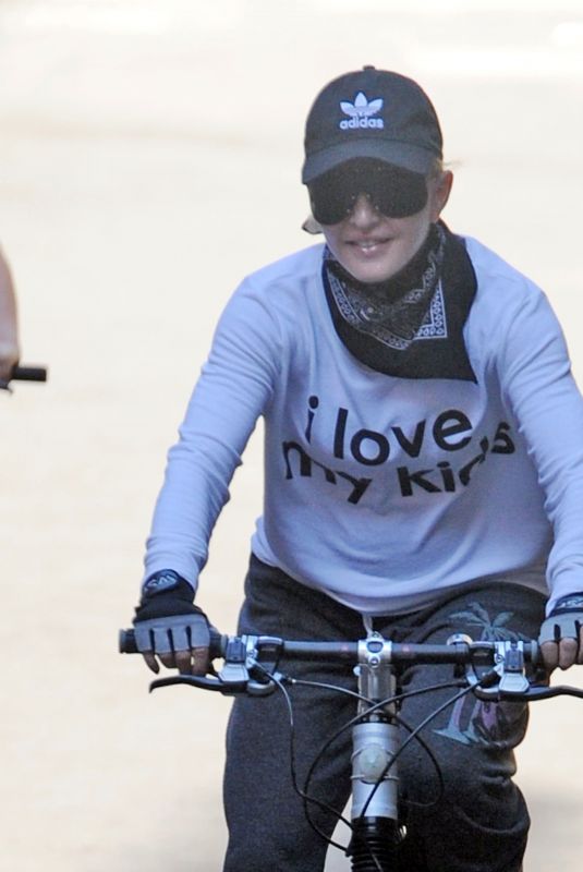 MADONNA Out on Her Bike in London 07/11/2018