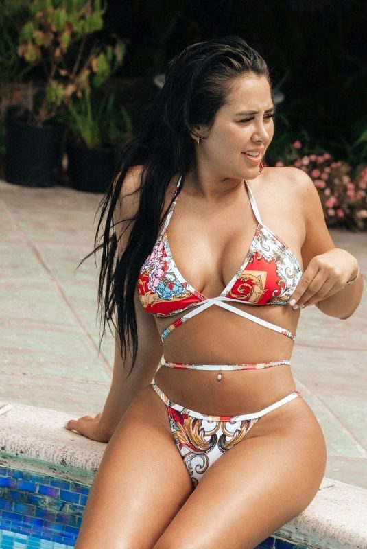 MARNIE SIMPSON in Bikini at a Pool in Marbella 07/10/2018