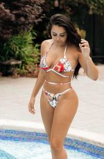 MARNIE SIMPSON in Bikini at a Pool in Marbella 07/10/2018
