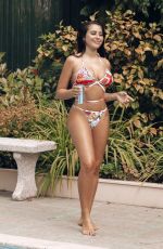 MARNIE SIMPSON in Bikini at a Pool in Marbella 07/10/2018