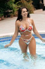 MARNIE SIMPSON in Bikini at a Pool in Marbella 07/10/2018