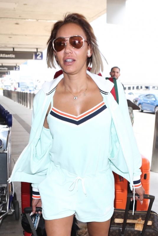 MELANIE BROWN at LAX Airport in Los Angeles 07/19/2018