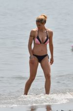 MICHELLE HUNZIKER in Bikini on the Beach in Italy 07/04/2018