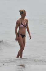 MICHELLE HUNZIKER in Bikini on the Beach in Italy 07/04/2018
