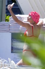MICHELLE HUNZIKER in Red Bikini at a Pool in Milano Marittima 07/10/2018