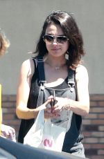 MILA KUNIS in Overalls Out Shopping in Los Angeles 07/05/2018