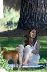 MINKA KELLY with Her Dog at a Park in Beverly Hills 07/17/2018
