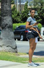 NICOLE MURPHY in Shorts Out with Her Dog in Beverly Hills 07/21/2018