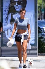 NICOLE MURPHY in Shorts Out with Her Dog in Beverly Hills 07/21/2018