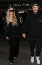 PARIS HILTON and Chris Zylka at LAX Airport in Los Angeles 07/27/2018