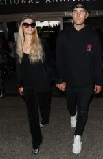 PARIS HILTON and Chris Zylka at LAX Airport in Los Angeles 07/27/2018