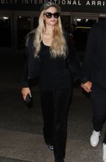 PARIS HILTON and Chris Zylka at LAX Airport in Los Angeles 07/27/2018