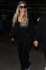 PARIS HILTON and Chris Zylka at LAX Airport in Los Angeles 07/27/2018