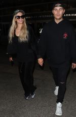 PARIS HILTON and Chris Zylka at LAX Airport in Los Angeles 07/27/2018