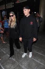 PARIS HILTON and Chris Zylka at LAX Airport in Los Angeles 07/27/2018