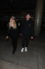 PARIS HILTON and Chris Zylka at LAX Airport in Los Angeles 07/27/2018