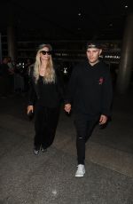 PARIS HILTON and Chris Zylka at LAX Airport in Los Angeles 07/27/2018