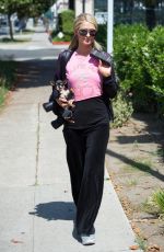 PARIS HILTON Out with Her Dog in Los Angeles 06/30/2018