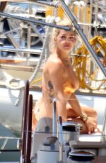 RITA ORA in a Gold Bikini at a Yacht in Barcelona 07/19/2018