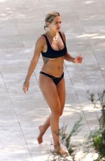RITA ORA in Bikini at a Pool in French Riviera 07/02/2018
