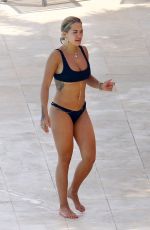 RITA ORA in Bikini at a Pool in French Riviera 07/02/2018