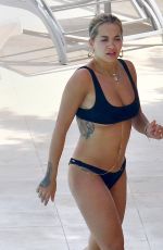 RITA ORA in Bikini at a Pool in French Riviera 07/02/2018