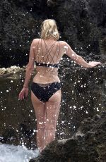 ROBIN WRIGHT in Bikini and Clement Giraudet at a Beach in Capri 07/22/2018