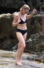 ROBIN WRIGHT in Bikini and Clement Giraudet at a Beach in Capri 07/22/2018
