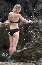 ROBIN WRIGHT in Bikini and Clement Giraudet at a Beach in Capri 07/22/2018