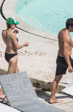 ROBIN WRIGHT in Bikini at a Pool in Positano 07/25/2018