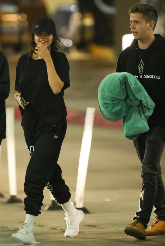 SELENA GOMEZ and Caleb Stevens Night Out in Los Angeles 07/27/2018