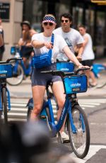 SOPHIE TURNER at a Ride on Citibikes to Celebrate 4th of July in New York 07/04/2018