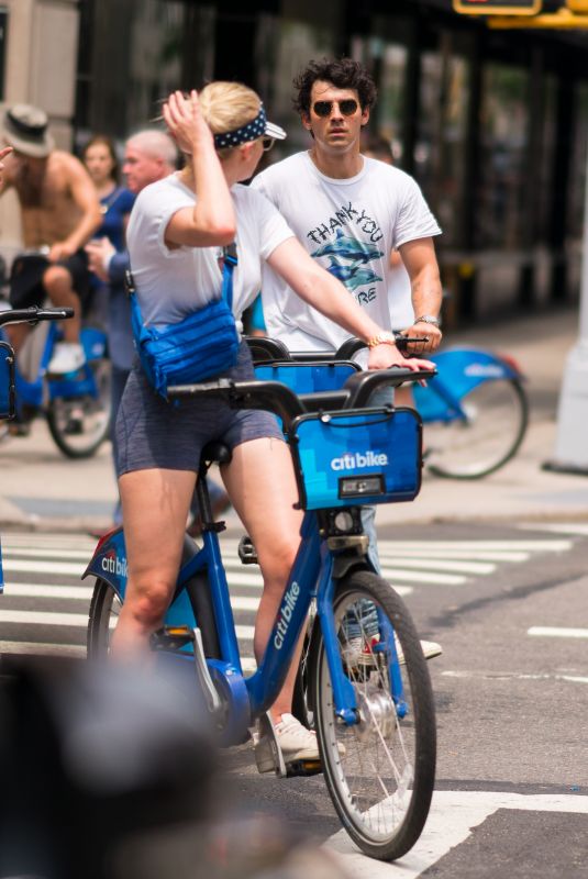 SOPHIE TURNER at a Ride on Citibikes to Celebrate 4th of July in New York 07/04/2018