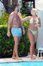 AMBER TURNER in Bikini at a Pool in Greece 08/19/2018