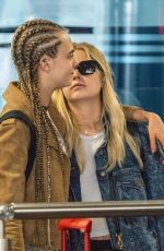 CARA DELEVINGNE and ASHLEY BENSON at Heathrow Airport in London 08/13/2018