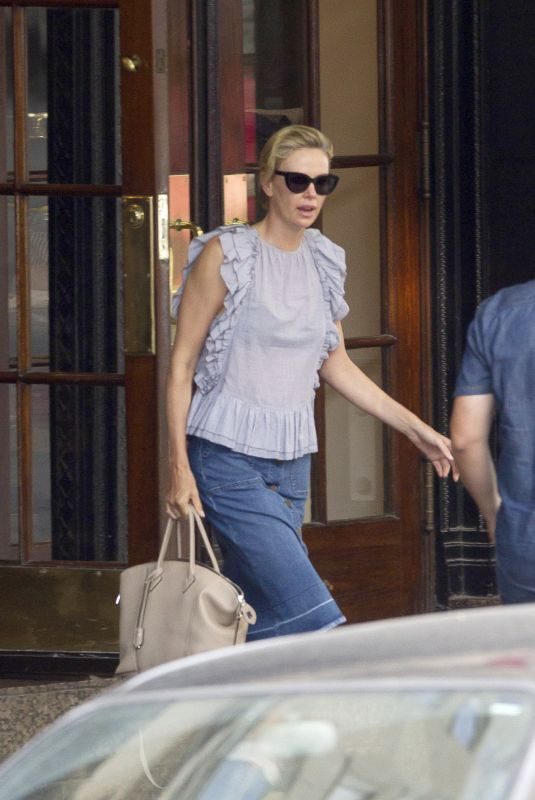 CHARLIZE THERON Leaves Her Hotel in Montreal 08/22/2018