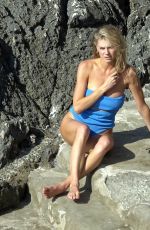 CHARLOTTE MCKINNEY in Bikini at a Beach in Capri 08/13/2018