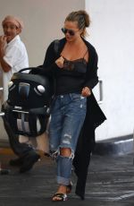 CHRISSTY TEIGEN in Ripped Jeans Out in Los Angeles 08/22/2018