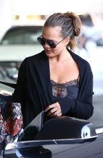 CHRISSTY TEIGEN in Ripped Jeans Out in Los Angeles 08/22/2018