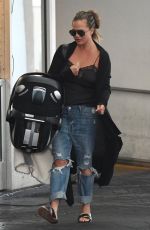 CHRISSTY TEIGEN in Ripped Jeans Out in Los Angeles 08/22/2018
