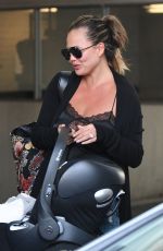 CHRISSTY TEIGEN in Ripped Jeans Out in Los Angeles 08/22/2018
