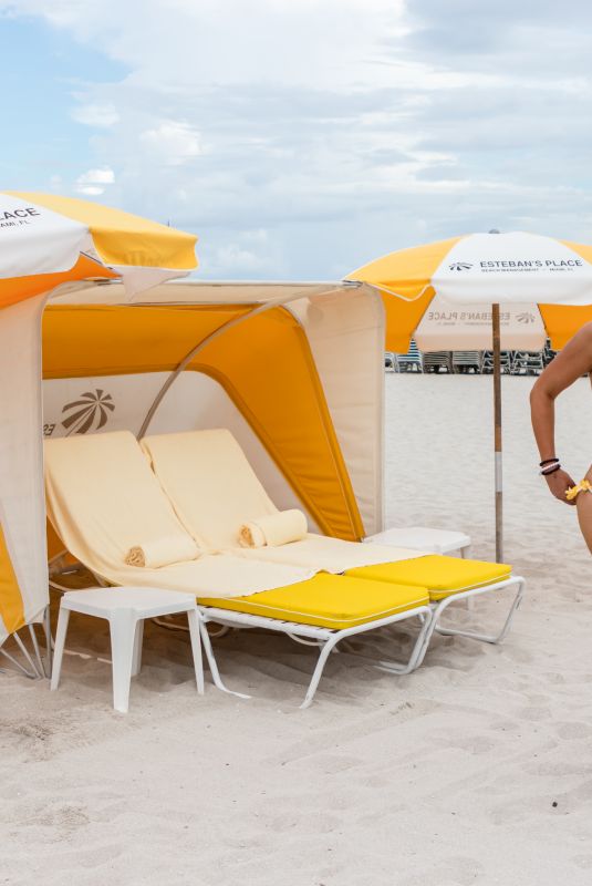 CLAUDIA ROMANI in Bikini on the Beach in Miami 08/19/2018