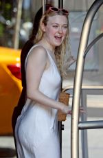 DAKOTA FANNINF with a Luggage Cart Out in New York 08/23/2018