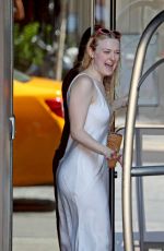 DAKOTA FANNINF with a Luggage Cart Out in New York 08/23/2018