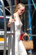 DAKOTA FANNINF with a Luggage Cart Out in New York 08/23/2018