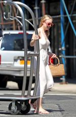 DAKOTA FANNINF with a Luggage Cart Out in New York 08/23/2018