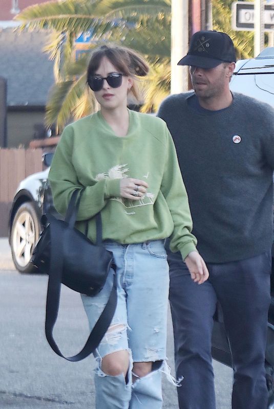 DAKOTA JOHNSON and Chris Martin Out for Dinner in Santa Monica 08/18/2018