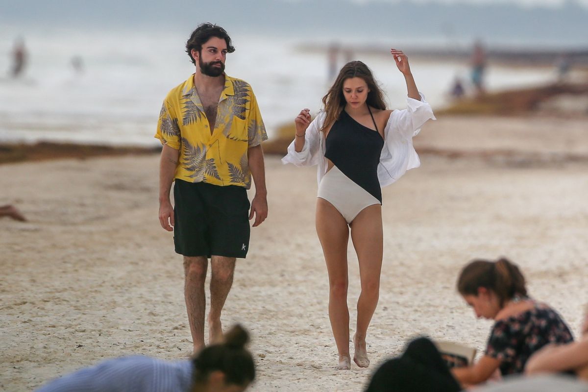 ELIZABETH OLSEN in Swimsuit on the Beach in Mexico 07/28/2018.
