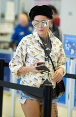 HALSEY in Denim Cutoff at JFK Airport in New York 08/23/2018